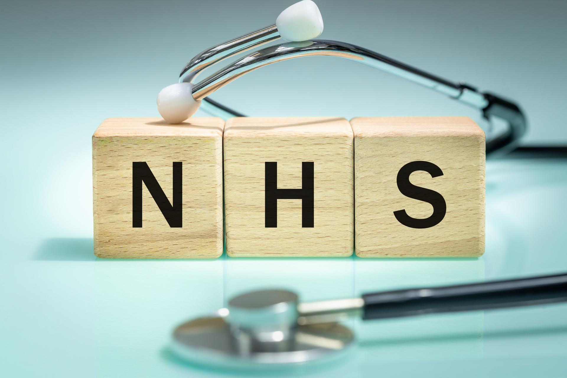 NHS, Lettering on Wooden Blocks, National Health Service, collective name for three of the four publicly funded health care systems in the UK. Help in health care