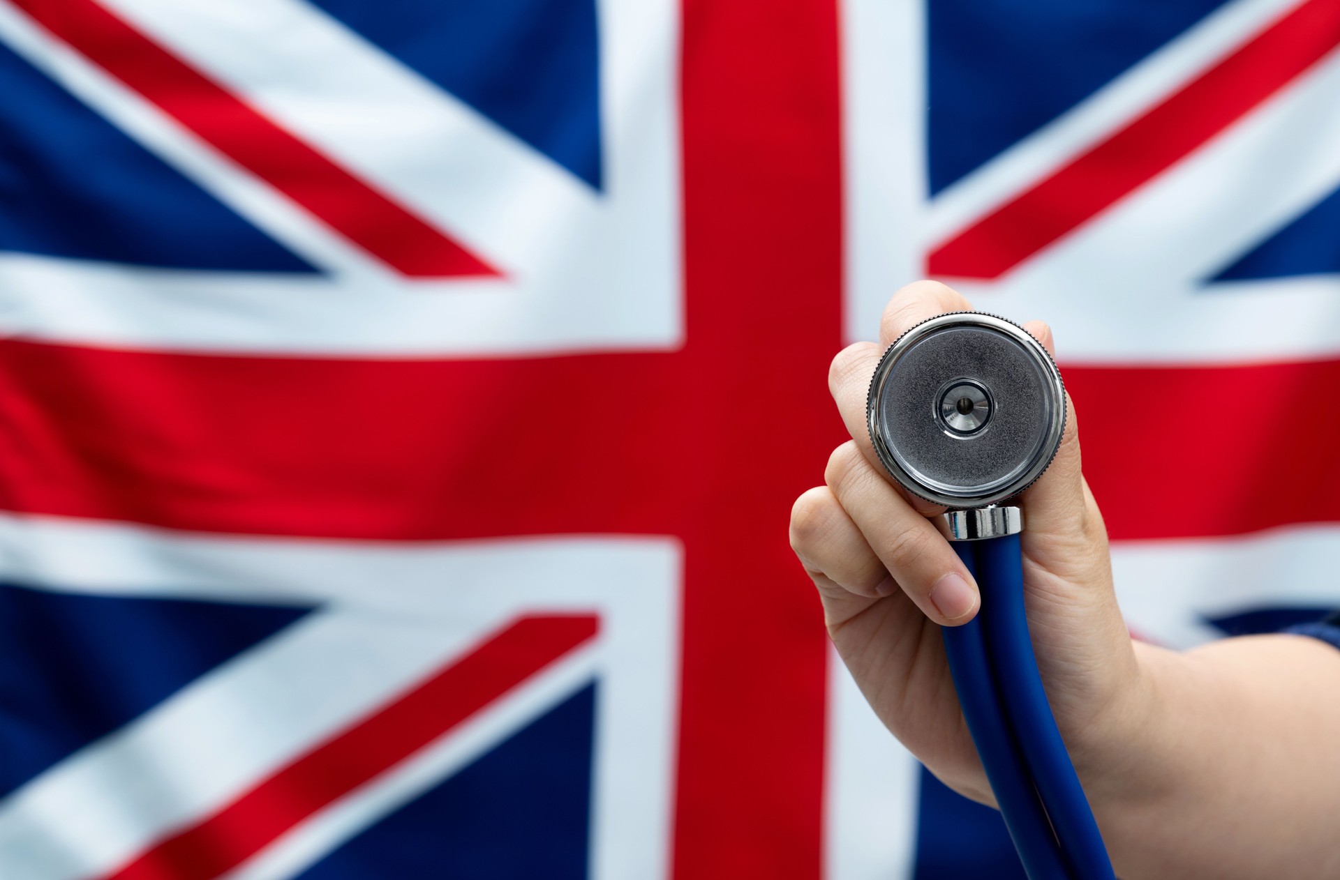 Stethoscope in front of British flag